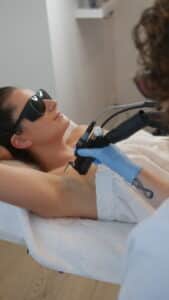 Woman receiving laser hair removal treatment at Olakino Laser + Skin in Victoria